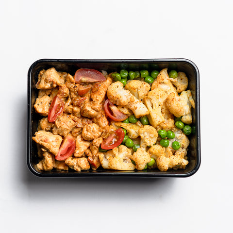 Creamy Tomato Chicken with Spiced Cauliflower & Peas