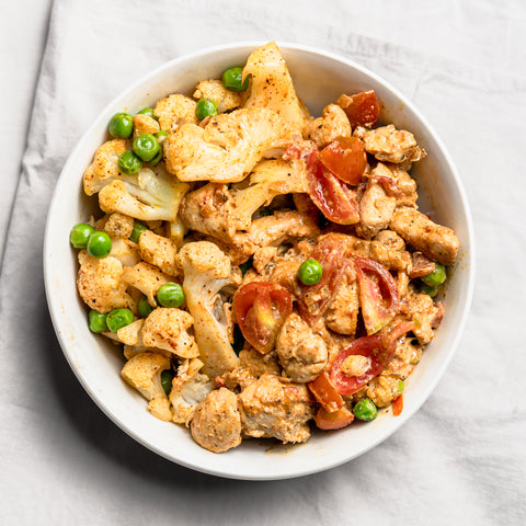 Creamy Tomato Chicken with Spiced Cauliflower & Peas